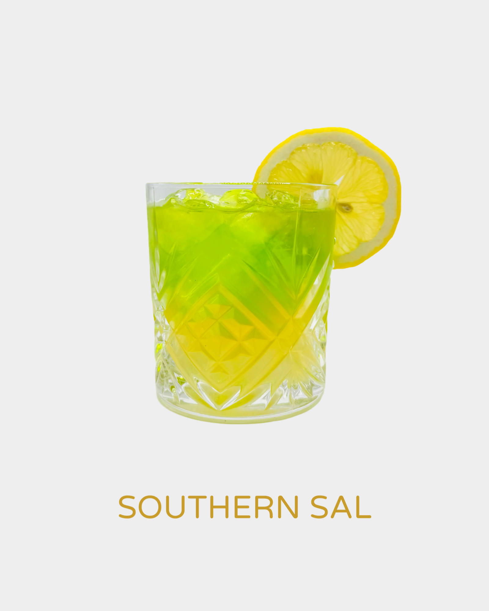 Southern Sal cocktail in a crystal glass with a vibrant green and yellow gradient, served over ice and garnished with a lemon slice. A bold and refreshing drink featuring handcrafted organic limoncello from Iannetelli Liqueurs.